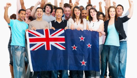 Group of people holding NZ flag